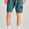 Shorts viola tessuto verde
