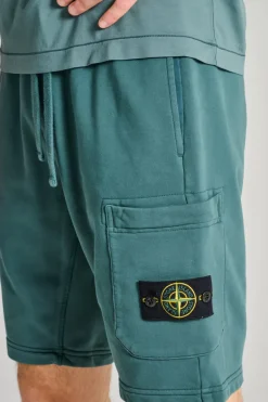 Shorts viola tessuto verde