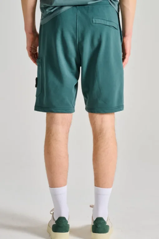 Shorts viola tessuto verde